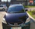 Черный Мазда 5, объемом двигателя 2 л и пробегом 292 тыс. км за 6500 $, фото 1 на Automoto.ua