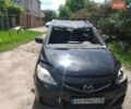Черный Мазда 5, объемом двигателя 2 л и пробегом 260 тыс. км за 2200 $, фото 1 на Automoto.ua