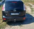 Черный Мазда 5, объемом двигателя 2 л и пробегом 229 тыс. км за 5200 $, фото 1 на Automoto.ua