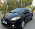 Черный Мазда 5, объемом двигателя 1.8 л и пробегом 185 тыс. км за 6000 $, фото 1 на Automoto.ua
