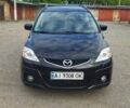 Черный Мазда 5, объемом двигателя 2 л и пробегом 300 тыс. км за 5600 $, фото 1 на Automoto.ua