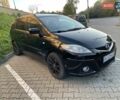 Черный Мазда 5, объемом двигателя 2 л и пробегом 325 тыс. км за 6200 $, фото 1 на Automoto.ua