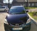 Черный Мазда 5, объемом двигателя 2 л и пробегом 292 тыс. км за 6000 $, фото 1 на Automoto.ua