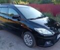 Черный Мазда 5, объемом двигателя 2 л и пробегом 148 тыс. км за 6500 $, фото 2 на Automoto.ua