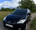 Черный Мазда 5, объемом двигателя 2 л и пробегом 293 тыс. км за 5500 $, фото 1 на Automoto.ua