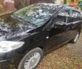 Черный Мазда 5, объемом двигателя 2 л и пробегом 212 тыс. км за 7000 $, фото 1 на Automoto.ua