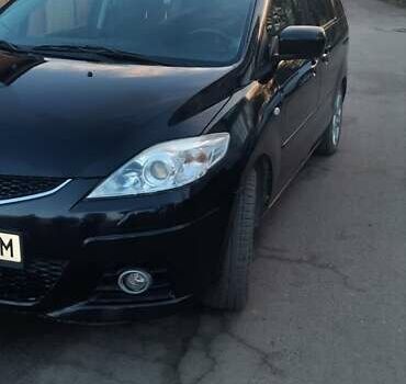 Черный Мазда 5, объемом двигателя 2 л и пробегом 230 тыс. км за 6200 $, фото 1 на Automoto.ua