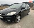 Черный Мазда 5, объемом двигателя 2 л и пробегом 236 тыс. км за 5800 $, фото 1 на Automoto.ua