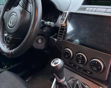 Черный Мазда 5, объемом двигателя 2 л и пробегом 228 тыс. км за 6700 $, фото 16 на Automoto.ua
