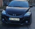 Черный Мазда 5, объемом двигателя 2 л и пробегом 230 тыс. км за 6200 $, фото 1 на Automoto.ua