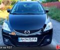 Черный Мазда 5, объемом двигателя 2 л и пробегом 148 тыс. км за 6900 $, фото 1 на Automoto.ua
