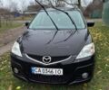 Черный Мазда 5, объемом двигателя 2 л и пробегом 228 тыс. км за 6700 $, фото 1 на Automoto.ua