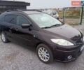 Черный Мазда 5, объемом двигателя 2 л и пробегом 242 тыс. км за 5450 $, фото 1 на Automoto.ua