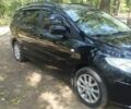 Черный Мазда 5, объемом двигателя 1.8 л и пробегом 178 тыс. км за 7200 $, фото 1 на Automoto.ua