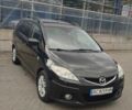 Чорний Мазда 5, об'ємом двигуна 2 л та пробігом 248 тис. км за 6200 $, фото 1 на Automoto.ua