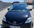 Черный Мазда 5, объемом двигателя 2 л и пробегом 263 тыс. км за 5500 $, фото 1 на Automoto.ua