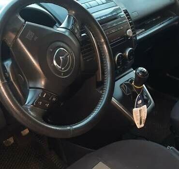 Черный Мазда 5, объемом двигателя 2 л и пробегом 230 тыс. км за 6200 $, фото 7 на Automoto.ua