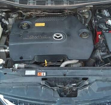 Черный Мазда 5, объемом двигателя 2 л и пробегом 230 тыс. км за 6200 $, фото 14 на Automoto.ua