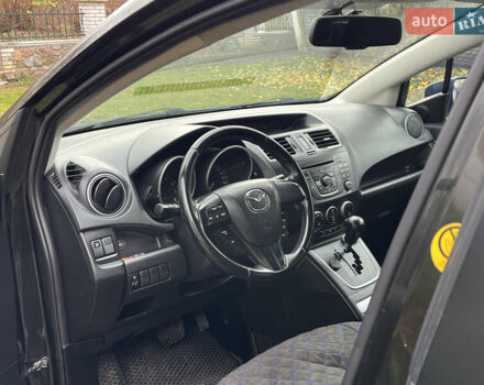 Черный Мазда 5, объемом двигателя 2 л и пробегом 231 тыс. км за 7699 $, фото 1 на Automoto.ua