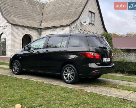 Черный Мазда 5, объемом двигателя 2 л и пробегом 231 тыс. км за 7999 $, фото 25 на Automoto.ua