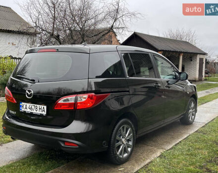 Чорний Мазда 5, об'ємом двигуна 2 л та пробігом 231 тис. км за 7999 $, фото 2 на Automoto.ua