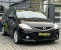 Черный Мазда 5, объемом двигателя 2 л и пробегом 161 тыс. км за 8000 $, фото 1 на Automoto.ua