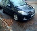 Черный Мазда 5, объемом двигателя 2 л и пробегом 210 тыс. км за 6100 $, фото 1 на Automoto.ua