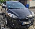 Черный Мазда 5, объемом двигателя 2 л и пробегом 210 тыс. км за 5163 $, фото 1 на Automoto.ua
