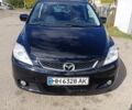 Черный Мазда 5, объемом двигателя 1.8 л и пробегом 227 тыс. км за 6500 $, фото 1 на Automoto.ua