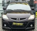 Черный Мазда 5, объемом двигателя 2 л и пробегом 161 тыс. км за 8000 $, фото 1 на Automoto.ua
