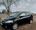 Чорний Мазда 5, об'ємом двигуна 2 л та пробігом 246 тис. км за 6600 $, фото 1 на Automoto.ua