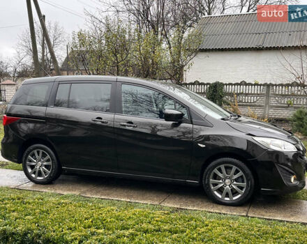 Чорний Мазда 5, об'ємом двигуна 2 л та пробігом 231 тис. км за 7999 $, фото 14 на Automoto.ua