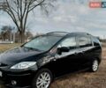 Черный Мазда 5, объемом двигателя 2 л и пробегом 246 тыс. км за 7000 $, фото 1 на Automoto.ua