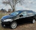 Черный Мазда 5, объемом двигателя 2 л и пробегом 250 тыс. км за 6598 $, фото 1 на Automoto.ua