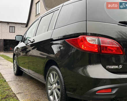 Чорний Мазда 5, об'ємом двигуна 2 л та пробігом 231 тис. км за 7999 $, фото 25 на Automoto.ua