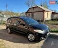 Черный Мазда 5, объемом двигателя 2 л и пробегом 280 тыс. км за 5900 $, фото 1 на Automoto.ua