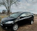 Черный Мазда 5, объемом двигателя 2 л и пробегом 246 тыс. км за 7000 $, фото 1 на Automoto.ua