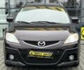 Черный Мазда 5, объемом двигателя 2 л и пробегом 161 тыс. км за 8000 $, фото 1 на Automoto.ua