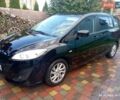 Черный Мазда 5, объемом двигателя 1.8 л и пробегом 260 тыс. км за 7700 $, фото 1 на Automoto.ua