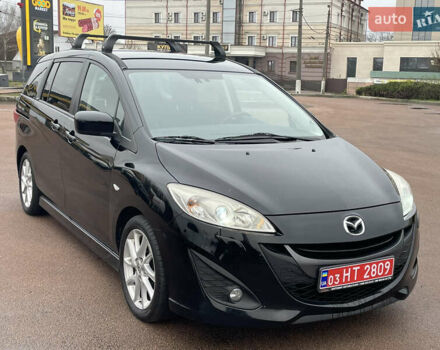 Черный Мазда 5, объемом двигателя 2 л и пробегом 210 тыс. км за 8100 $, фото 6 на Automoto.ua