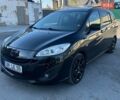 Черный Мазда 5, объемом двигателя 1.8 л и пробегом 230 тыс. км за 8500 $, фото 1 на Automoto.ua