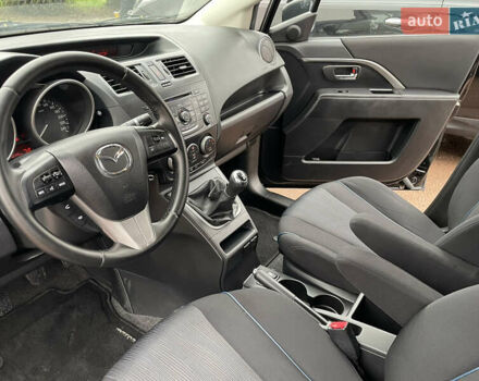 Черный Мазда 5, объемом двигателя 2 л и пробегом 210 тыс. км за 8100 $, фото 29 на Automoto.ua