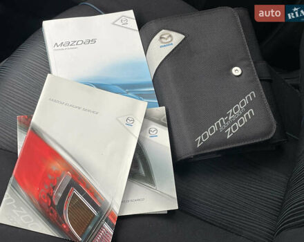 Черный Мазда 5, объемом двигателя 2 л и пробегом 210 тыс. км за 8100 $, фото 82 на Automoto.ua