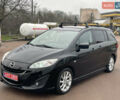 Черный Мазда 5, объемом двигателя 2 л и пробегом 210 тыс. км за 8100 $, фото 1 на Automoto.ua
