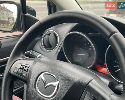 Черный Мазда 5, объемом двигателя 2 л и пробегом 210 тыс. км за 8100 $, фото 77 на Automoto.ua