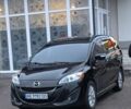 Черный Мазда 5, объемом двигателя 2.5 л и пробегом 220 тыс. км за 8400 $, фото 1 на Automoto.ua