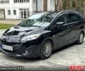 Чорний Мазда 5, об'ємом двигуна 2 л та пробігом 140 тис. км за 7850 $, фото 1 на Automoto.ua