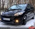 Черный Мазда 5, объемом двигателя 2 л и пробегом 140 тыс. км за 8799 $, фото 1 на Automoto.ua