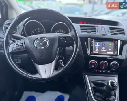 Черный Мазда 5, объемом двигателя 1.8 л и пробегом 171 тыс. км за 11000 $, фото 34 на Automoto.ua