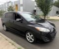 Черный Мазда 5, объемом двигателя 2.5 л и пробегом 124 тыс. км за 1780 $, фото 1 на Automoto.ua